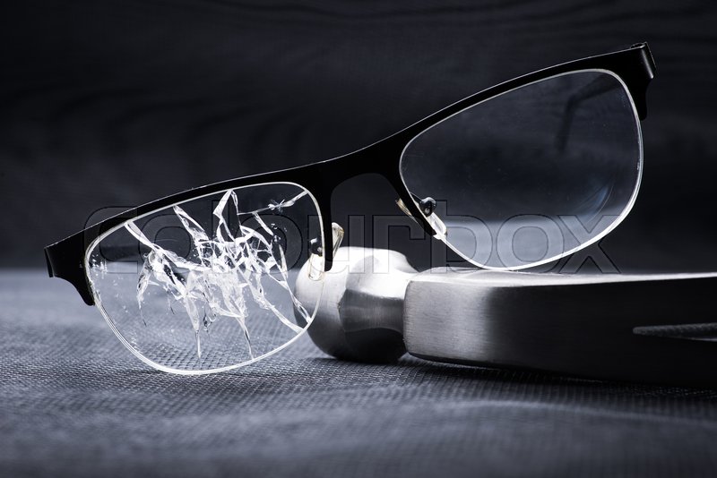 https%3A%2F%2Fwww.colourbox.com%2Fimage%2Fbroken-glasses-with-a-metal-mallet-on-black-background-image-29994630